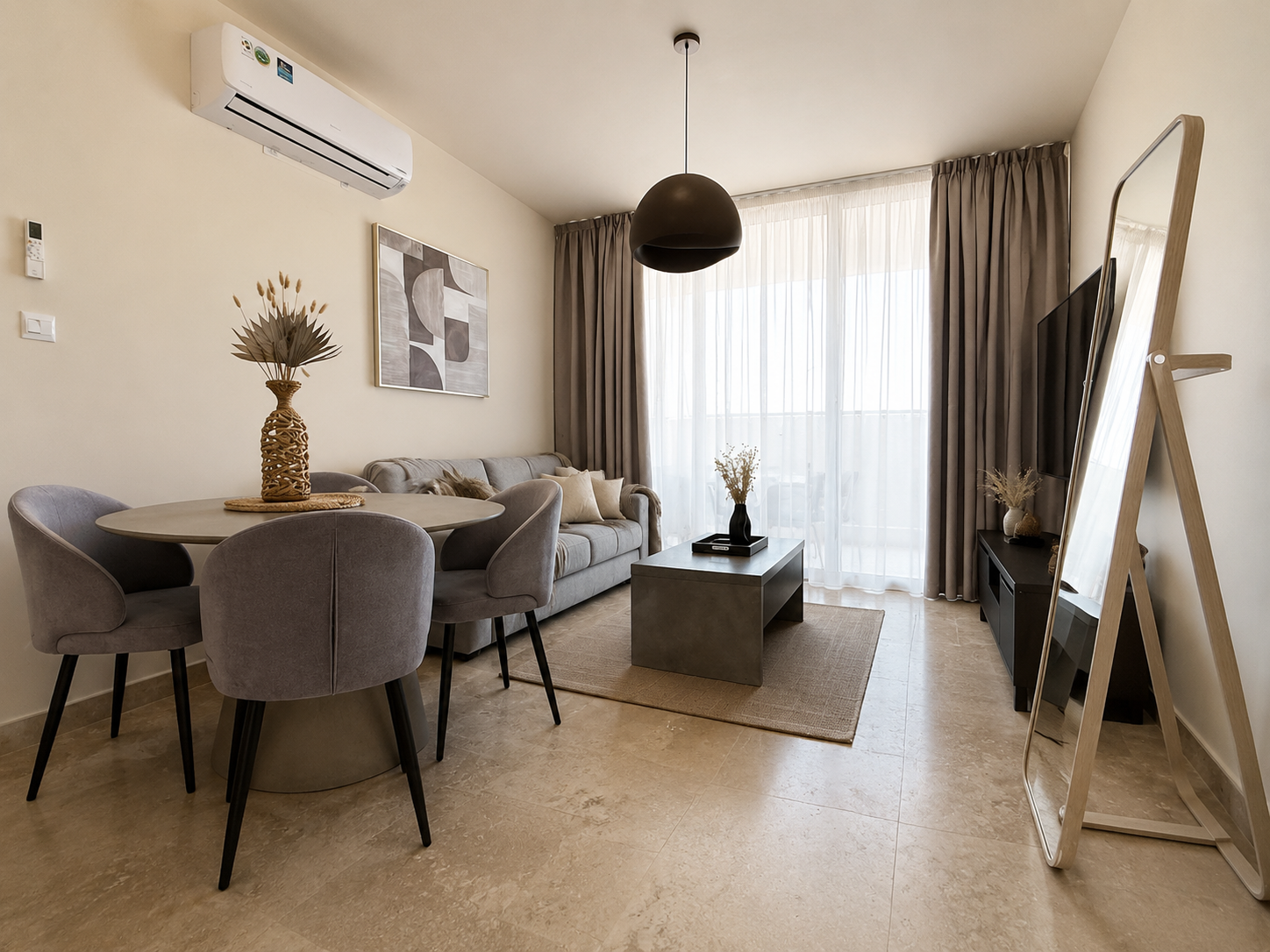 Bright open-plan living and dining room at Avalon Gardens B203 in Paphos